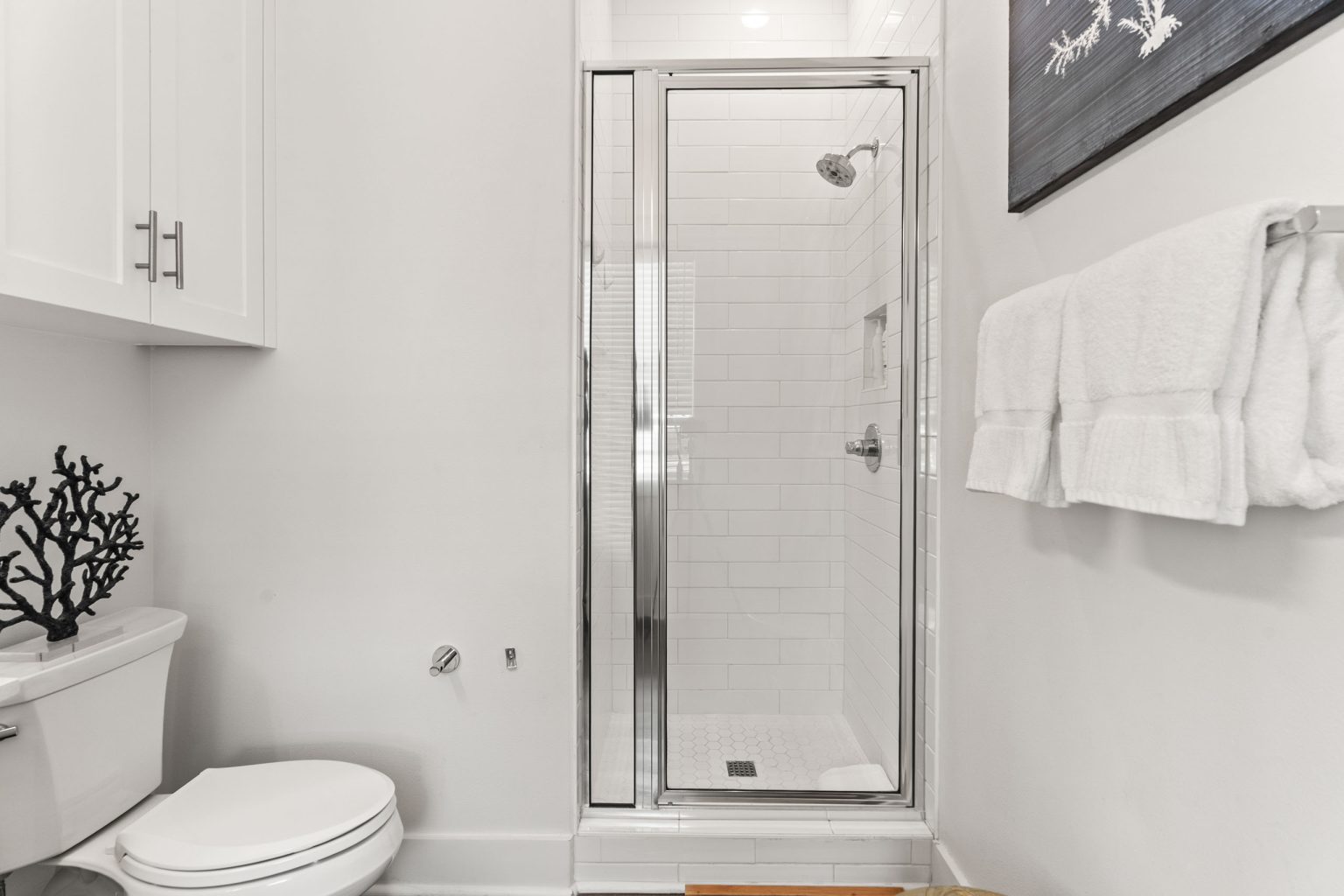 Bathroom with a glass-enclosed shower at 214 Sunset Avenue #4