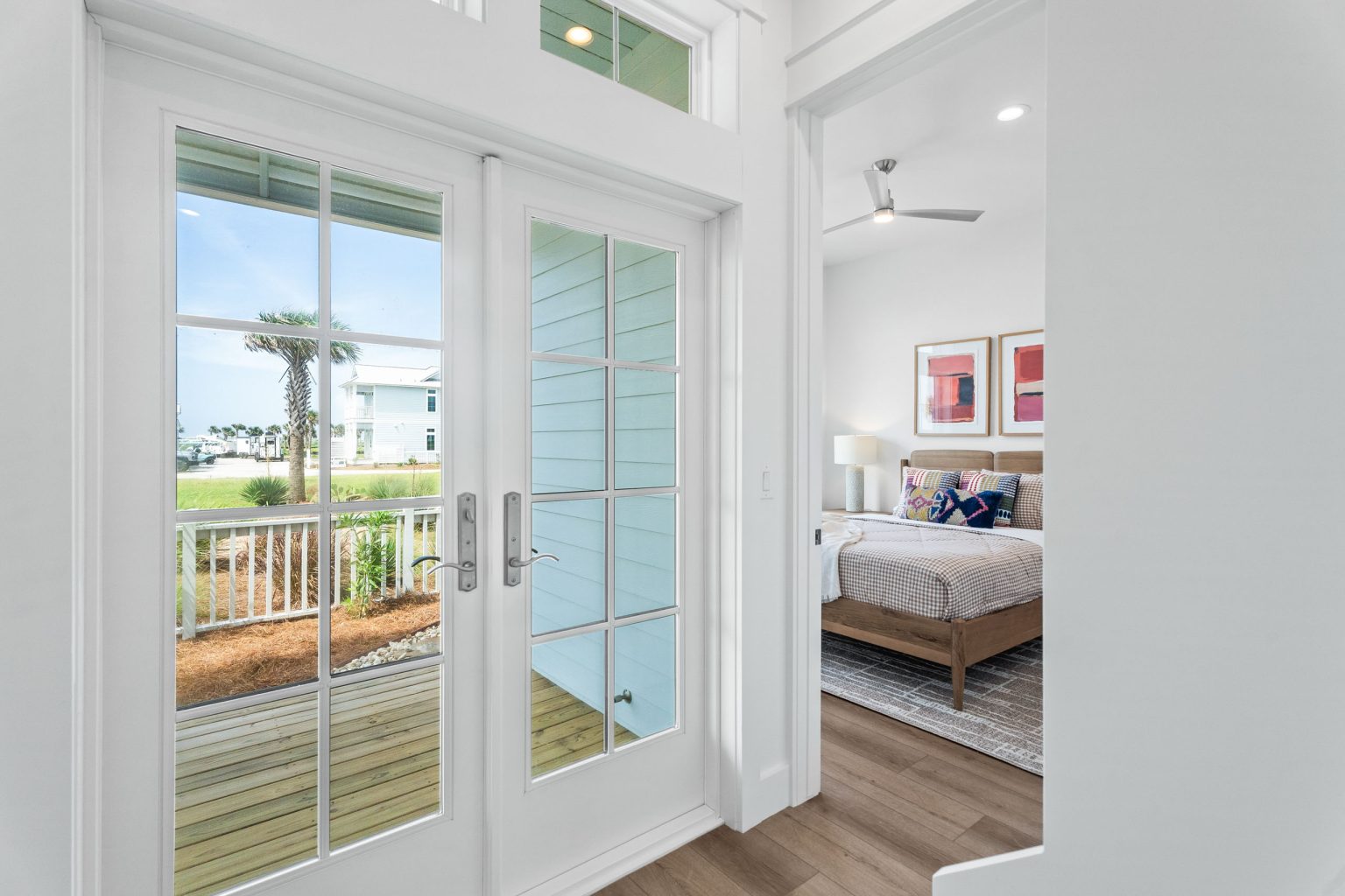 French doors to the porch beside a bedroom at 205 Horse Tail Lane