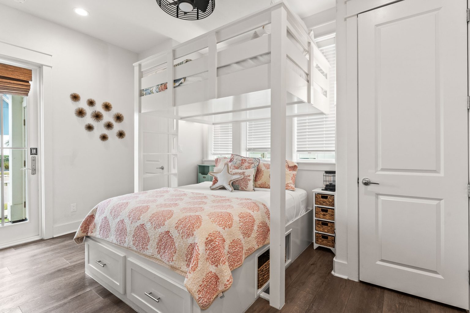Bedroom with a built-in loft bunk and coral bedding at 214 Sunset Avenue #5