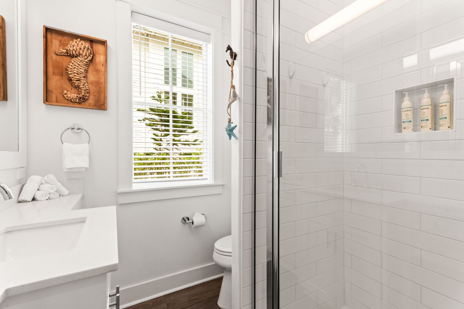 Bathroom with a white tiled shower at 214 Sunset Avenue #4