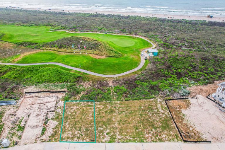 Aerial view outlining the 184 Shoregrass Loop lot facing the golf course