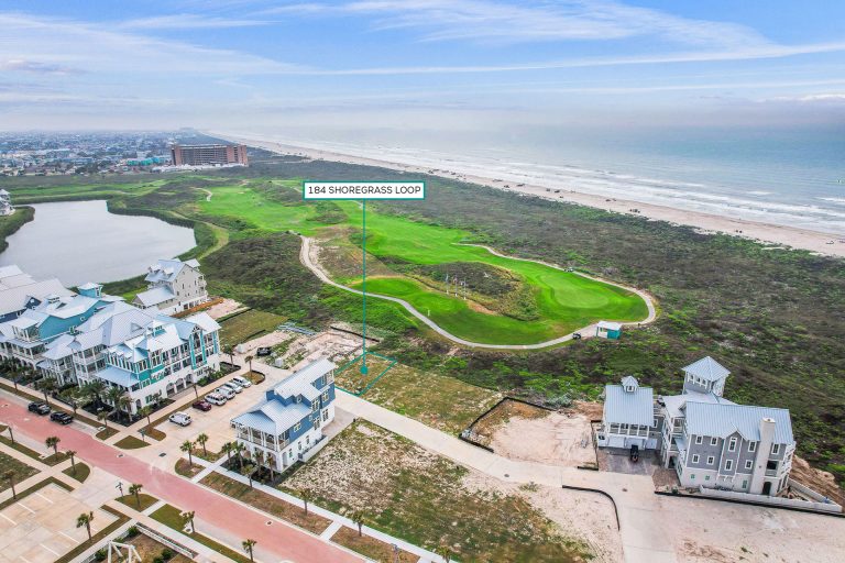 Aerial view marking the 184 Shoregrass Loop homesite near the golf course and Gulf