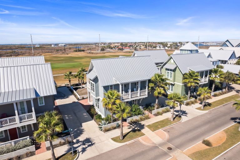 Aerial view of 200 Sunset Avenue and neighboring homes toward the golf course