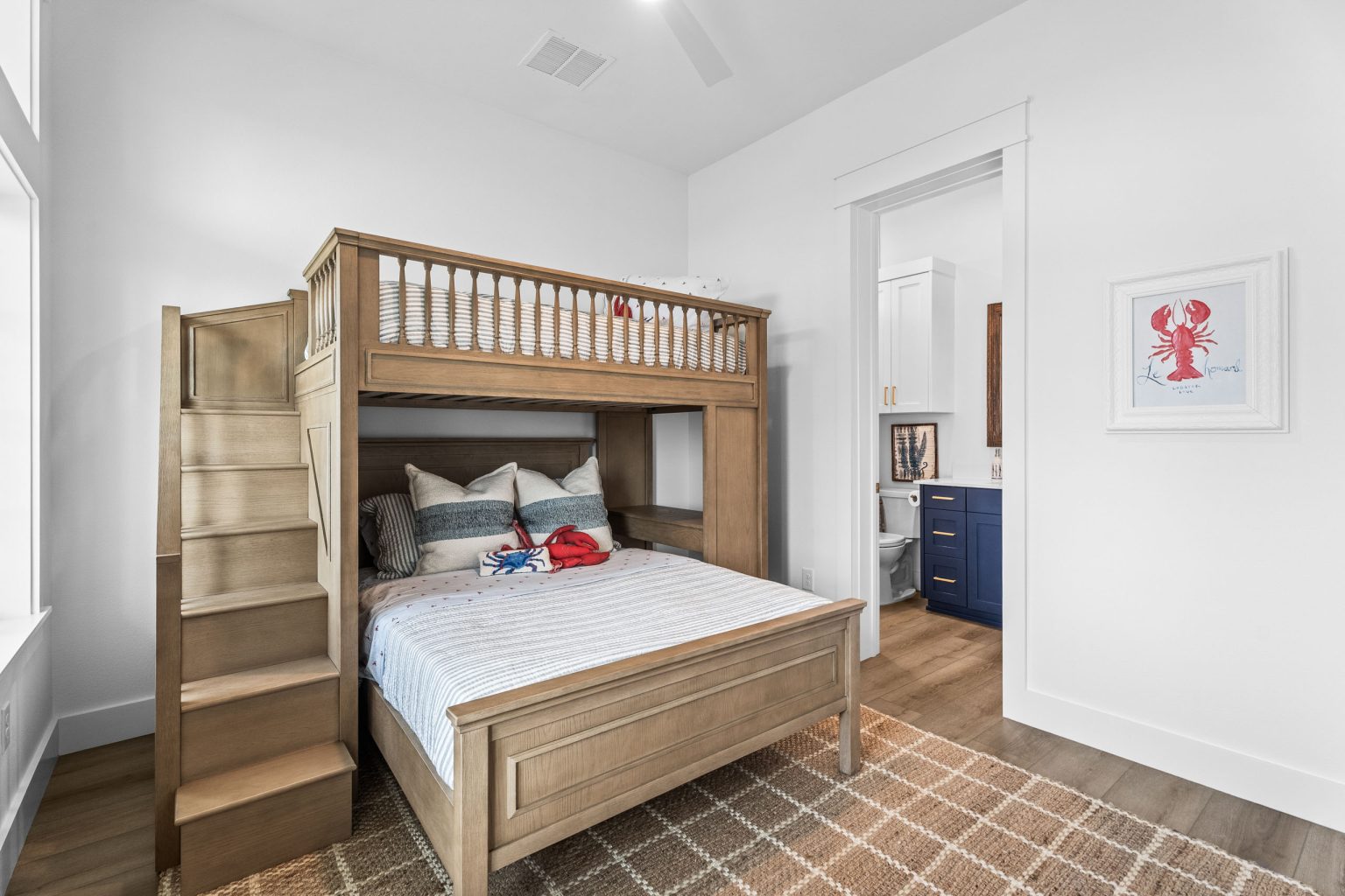 Bunk room with a wooden bunk bed and stair ladder at 209 Horse Tail Lane