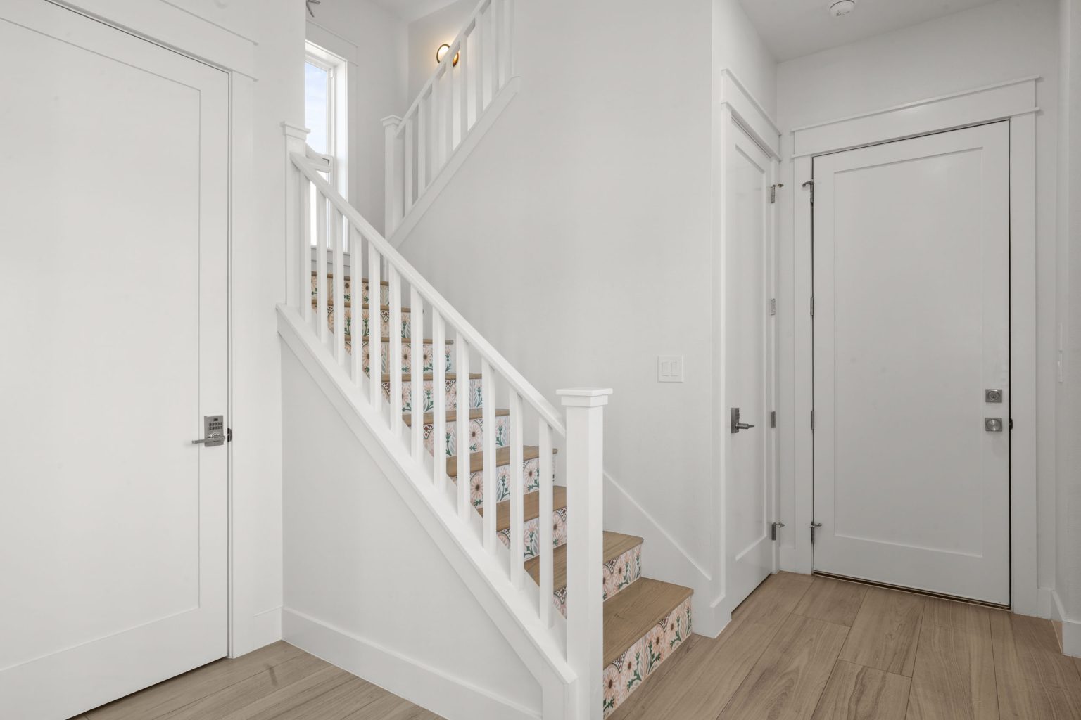 Entry with staircase and patterned tile risers at 724 Sunset Avenue