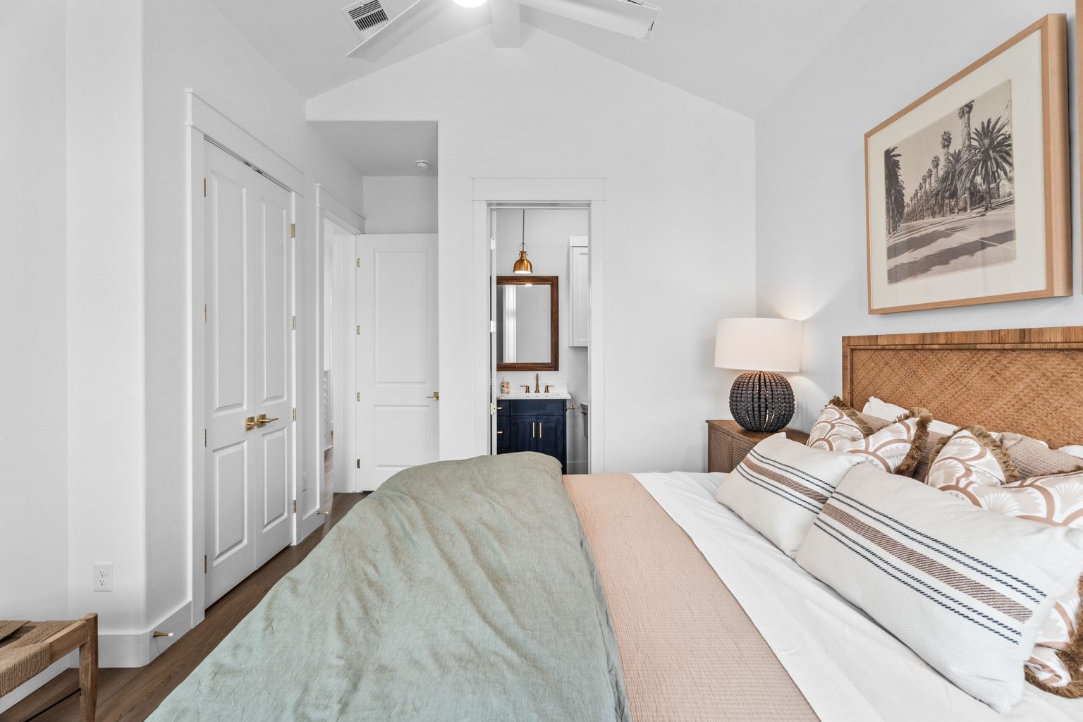 Bedroom with a view into the en suite bath at 209 Horse Tail Lane
