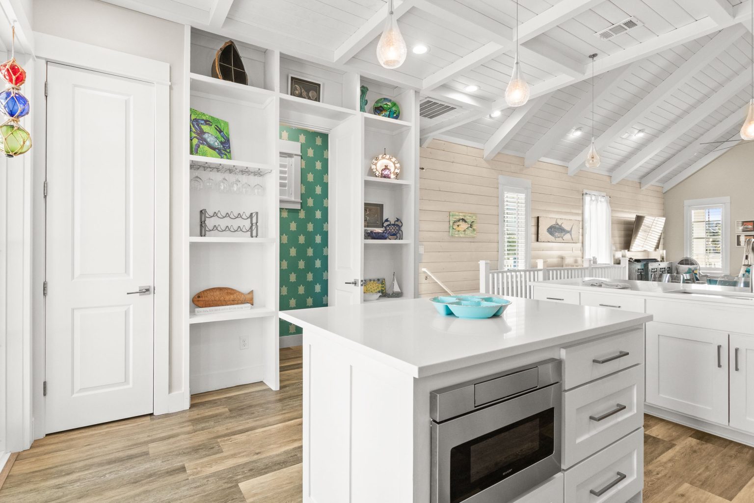 Kitchen island and built-in shelving at 152 Sea Rocket Lane