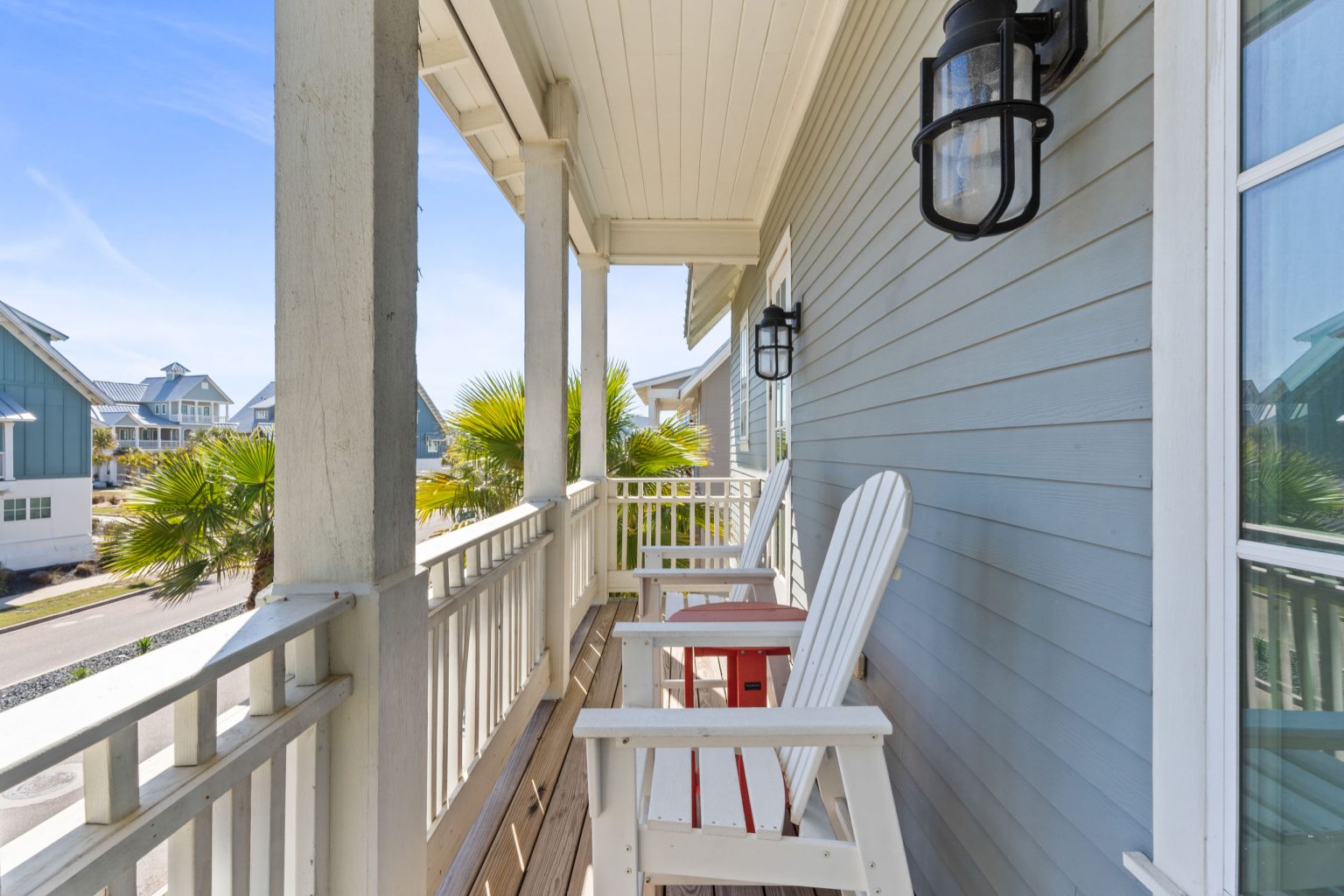 Front porch with white rocking chair at 200 Sunset Avenue