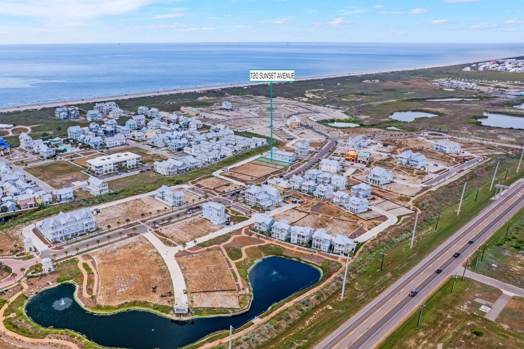 Aerial view marking the 720 Sunset Avenue homesite near a pond