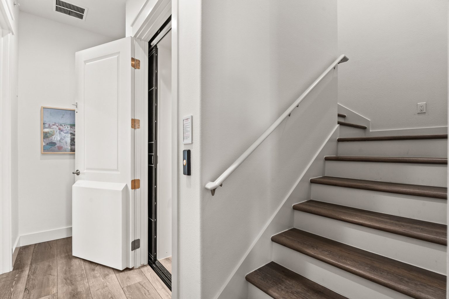 Stair landing and hallway at 250 Sunrise Avenue