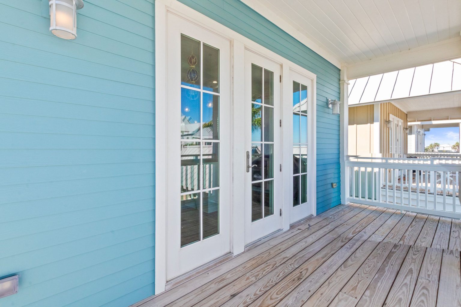 Upper porch with French doors at 152 Sea Rocket Lane
