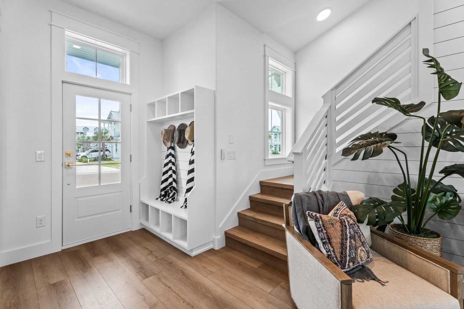 Entry with mudroom cubbies and staircase at 209 Horse Tail Lane