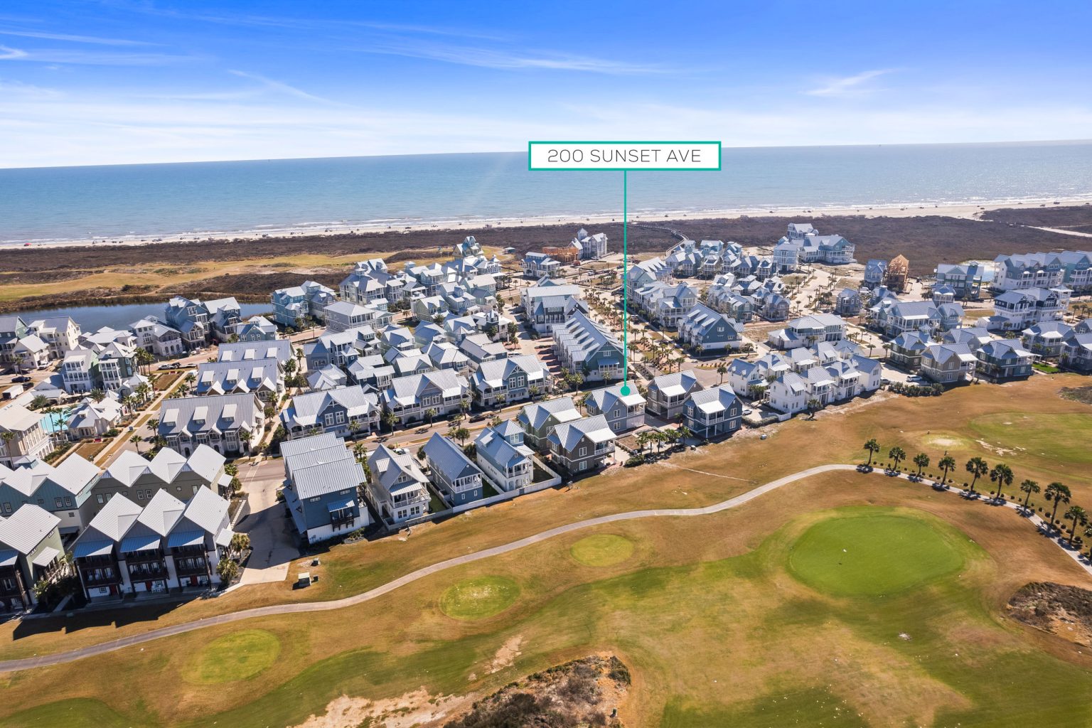 Aerial view marking 200 Sunset Avenue near the beach at Palmilla Beach