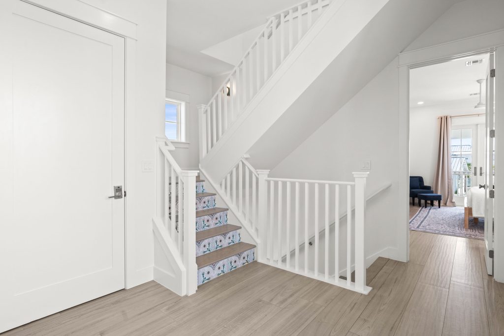 Staircase with patterned tile risers at 724 Sunset Avenue