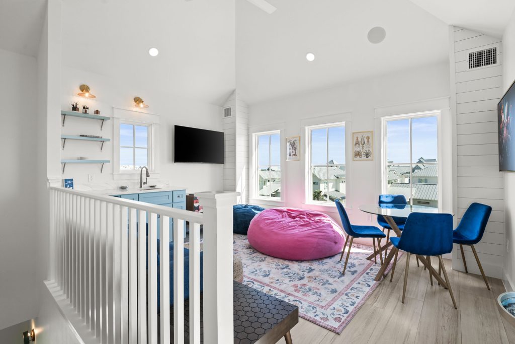 Upstairs bonus room with game table and bean bag at 724 Sunset Avenue