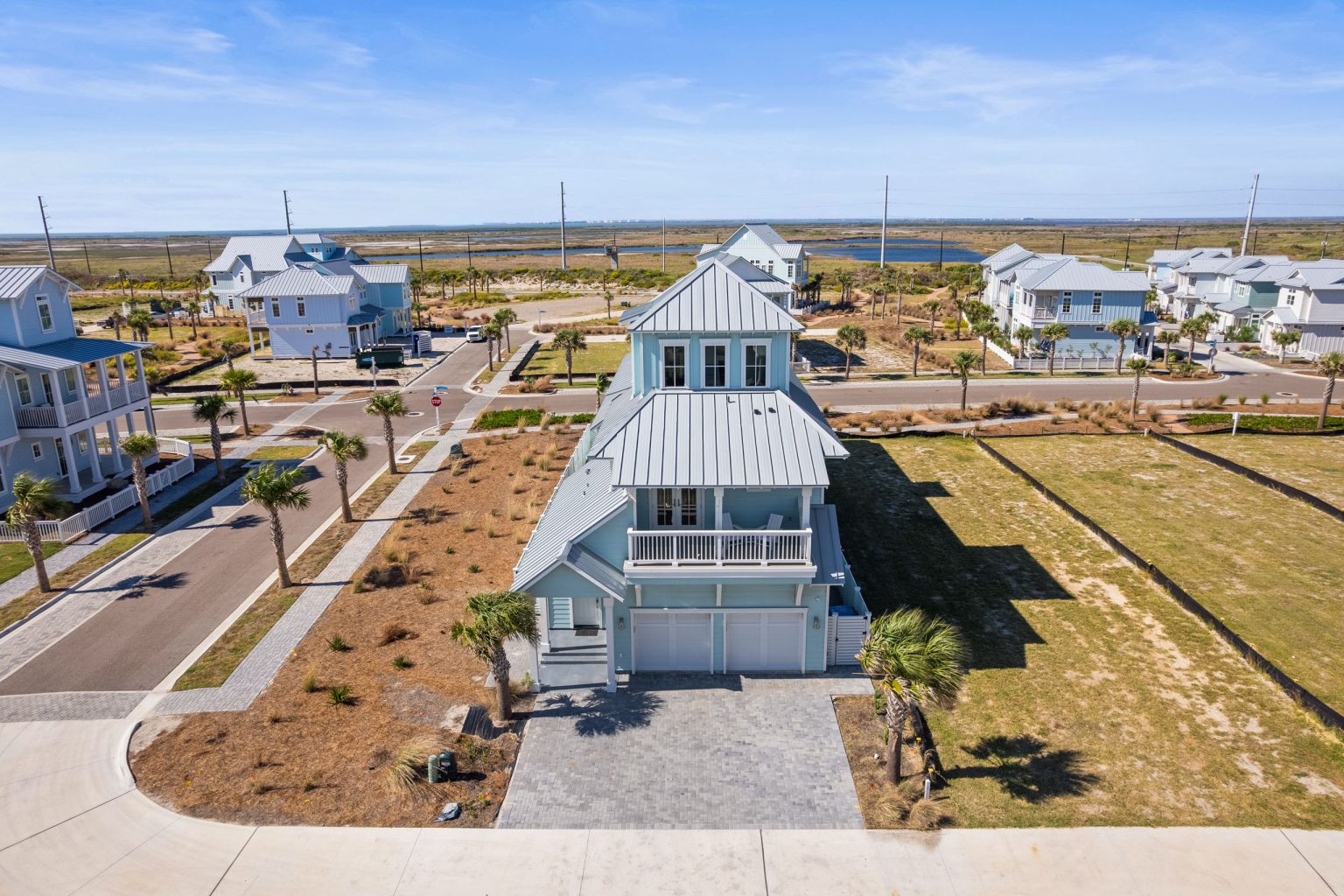 Aerial view of 724 Sunset Avenue and its paver driveway