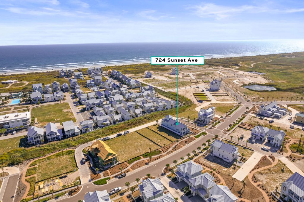 Aerial view marking 724 Sunset Avenue with the Gulf beyond