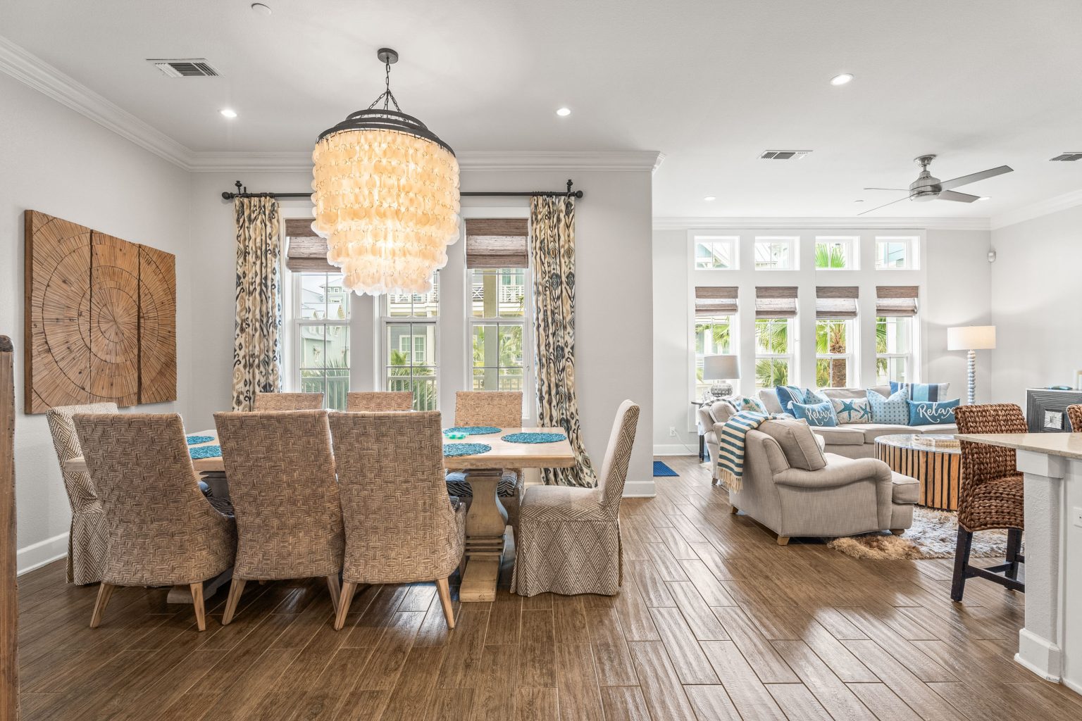 Dining area with a shell chandelier, open to the living room at 137 Palmilla Circle #204