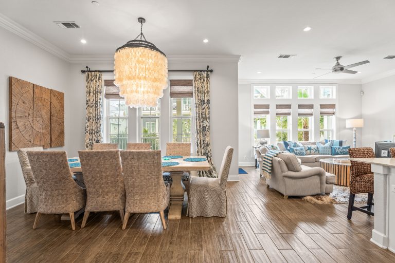 Dining area with a shell chandelier, open to the living room at 137 Palmilla Circle #204