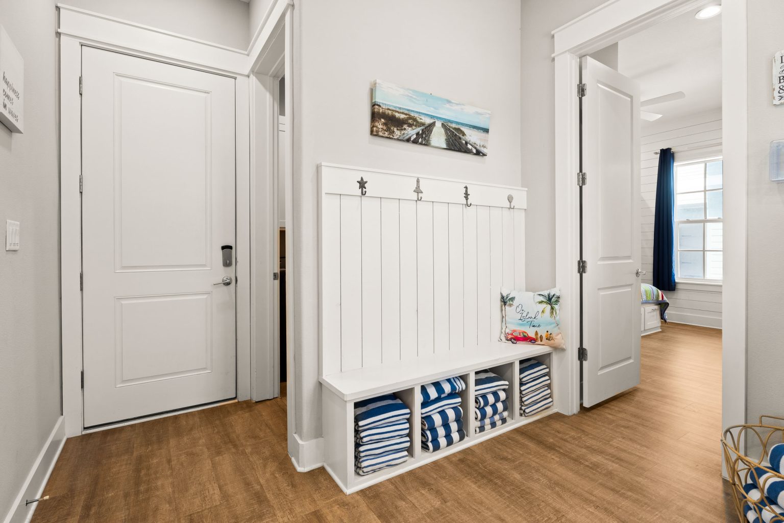 Mudroom entry with a storage bench and cubbies at 200 Sunset Avenue