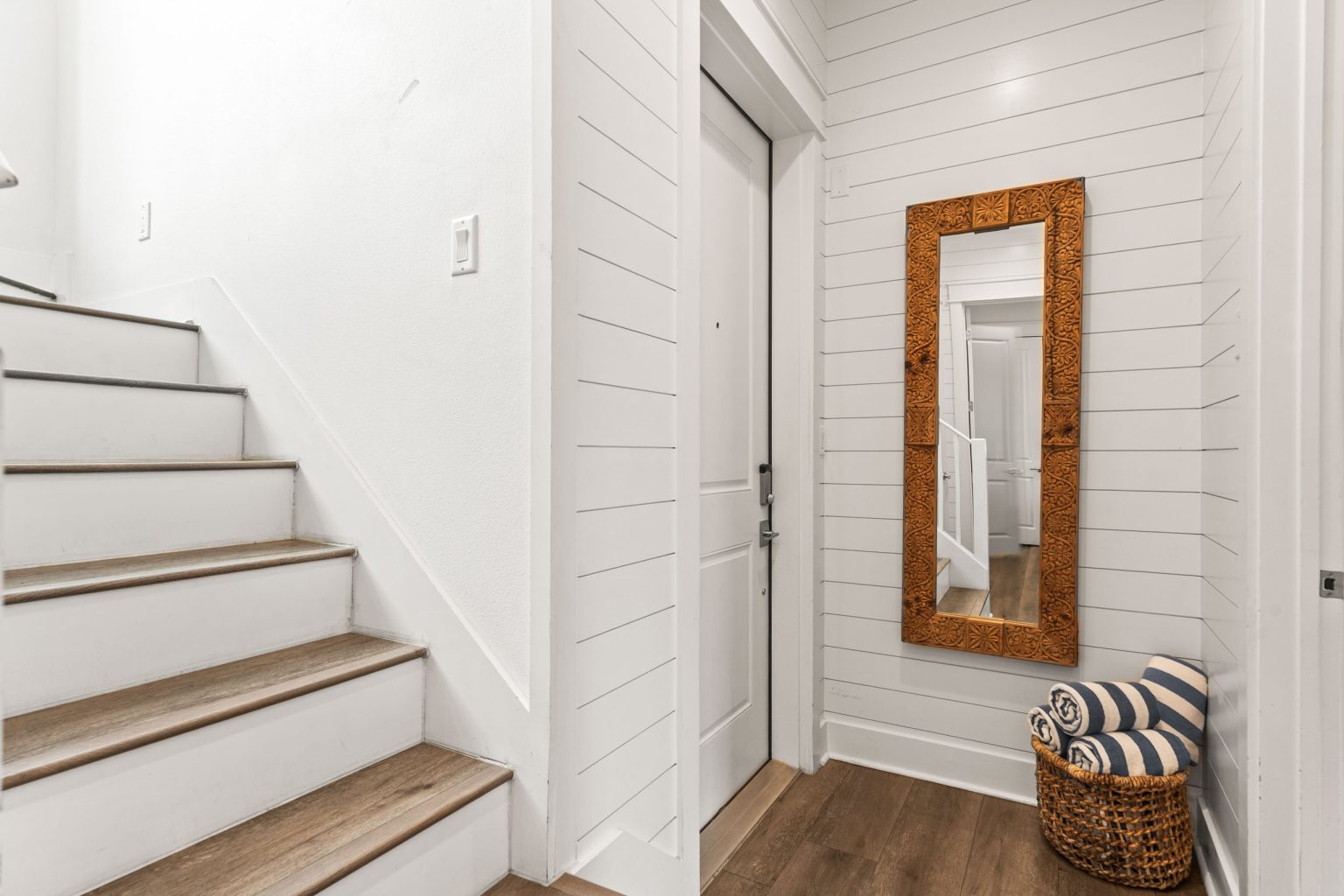 Entry with staircase and shiplap walls at 214 Sunset Avenue #4