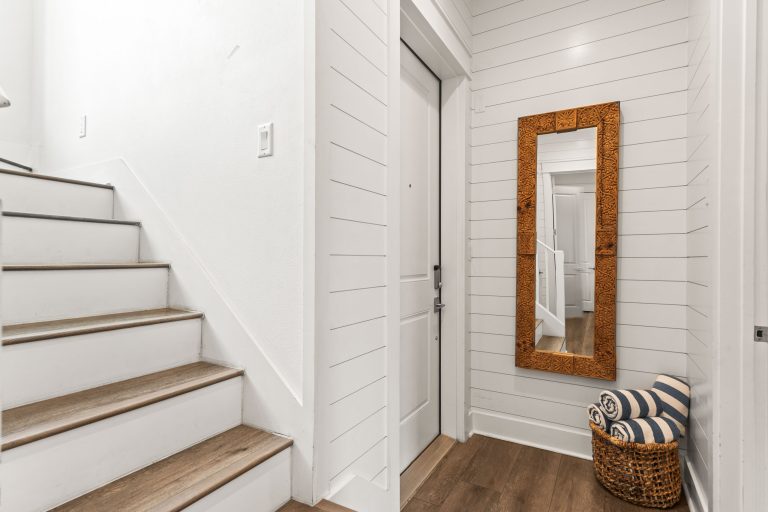 Entry with staircase and shiplap walls at 214 Sunset Avenue #4
