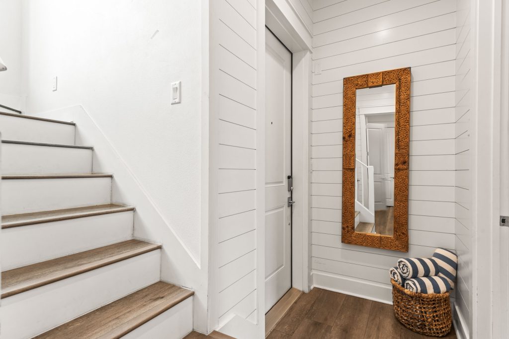Entry with staircase and shiplap walls at 214 Sunset Avenue #5