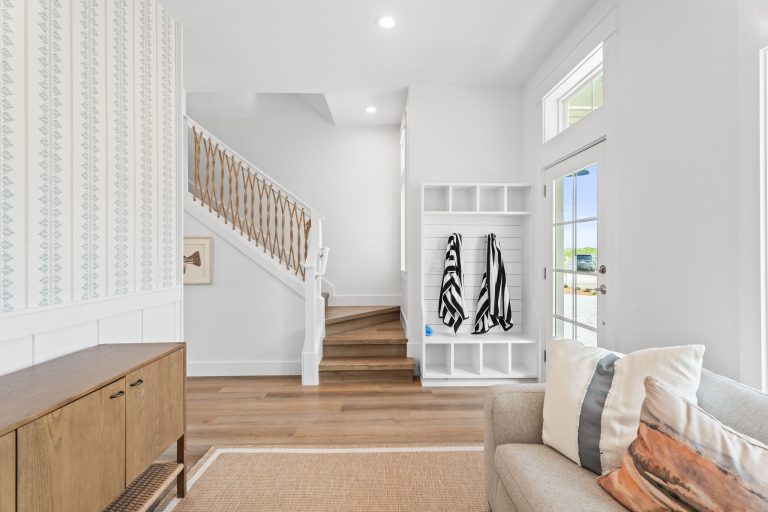 Entry with staircase and mudroom cubbies at 205 Horse Tail Lane