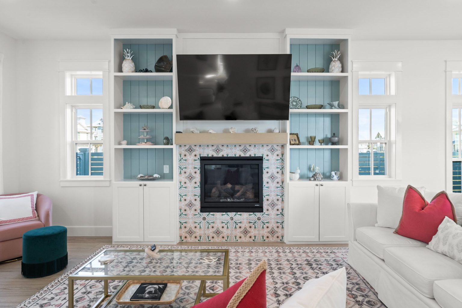 Living room with a tiled fireplace and built-in shelves at 724 Sunset Avenue