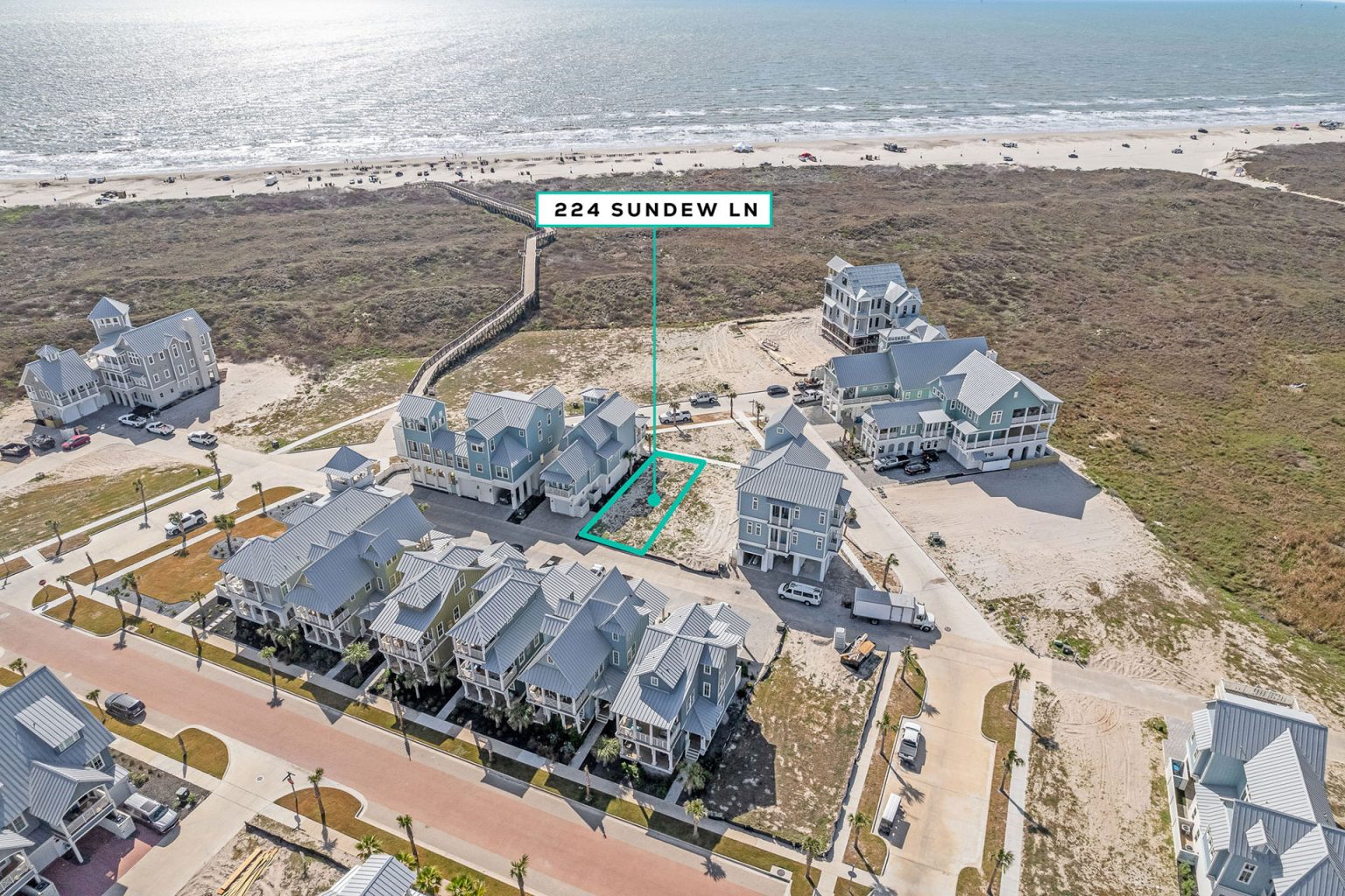 Aerial view marking the 224 Sundew Lane homesite near the beach at Palmilla Beach