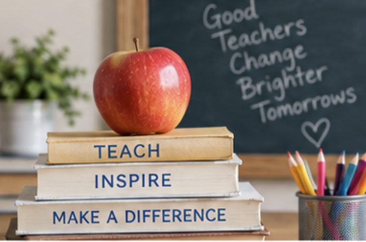 Apple on a stack of books reading Teach, Inspire, Make a Difference
